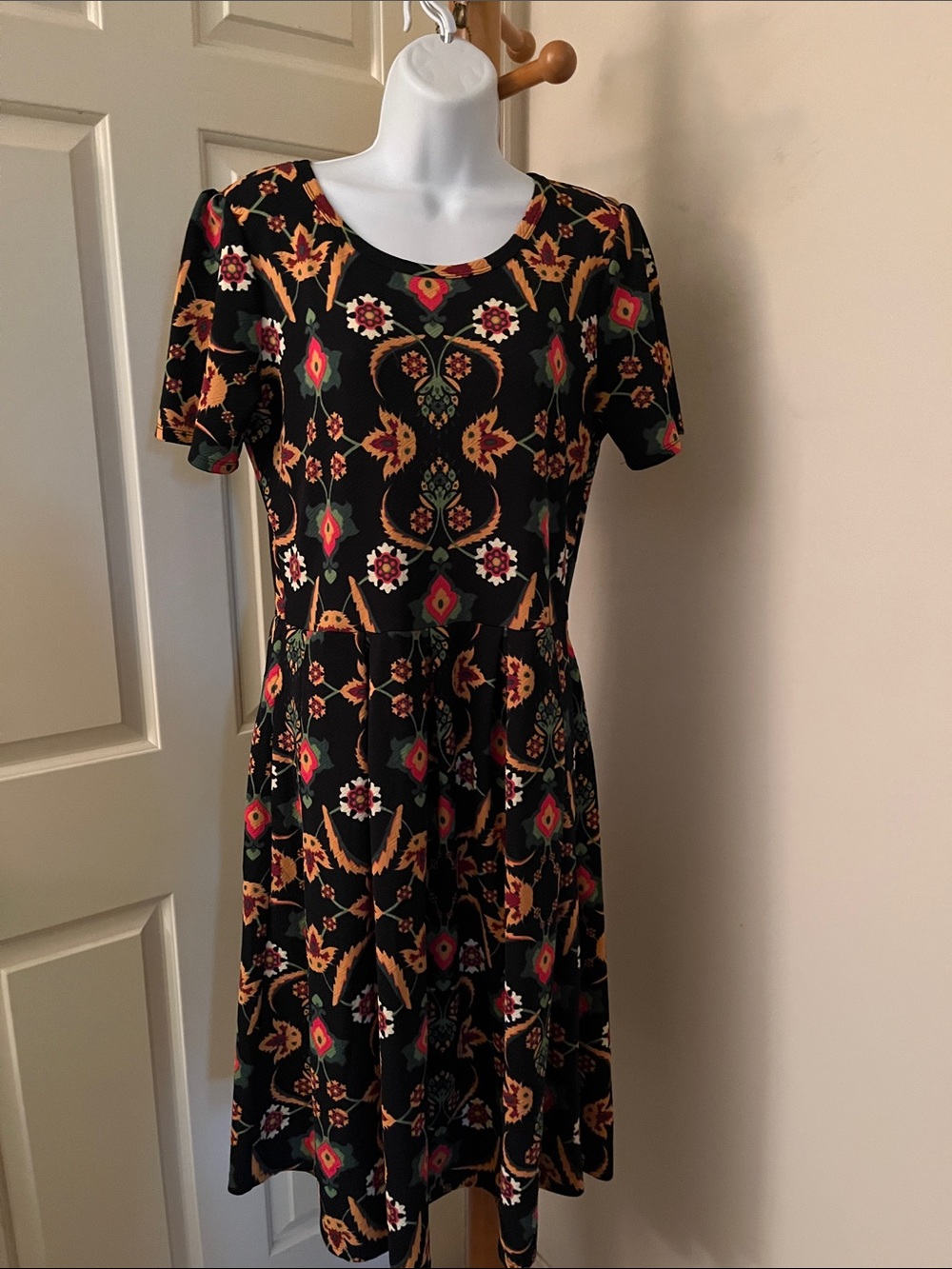 LuLaRoe Black Dress with Red, Orange, Green & Cream Floral-Geometric Print